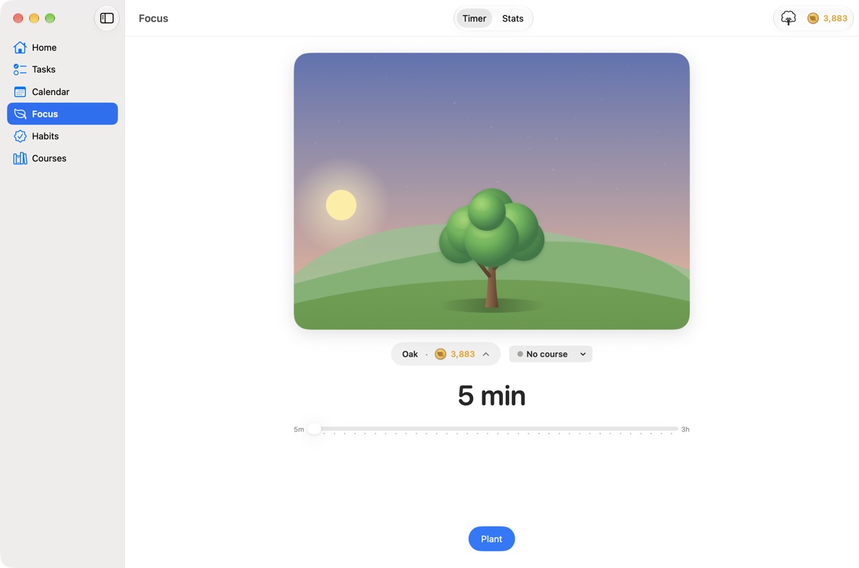 The Focus page: an oak tree on a hill under a night sky, with a course picker and a session length.
